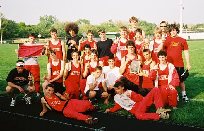 DFDC LEGACY: Kauffman poses with the 2004 conference champions. 