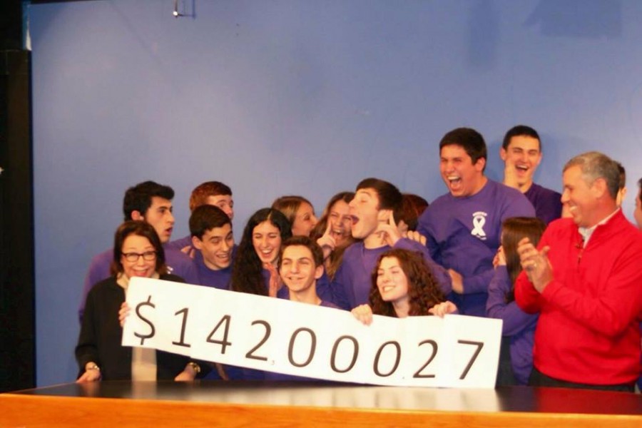 RECORD-BREAKING YEAR: Student Council members celebrate as the total amount of money raised for School Chest is announced. This years fundraiser, which will support the Rolfe Pancreatic Cancer Foundation, collected the most money in DHS history at nearly $142,000. 