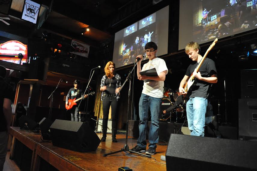 Senior Alec Lopata directs his annual charity event, Bands  Battling Cancer, at The Alley in Highwood. In 2014, the show raised $6,300.00 for the American Cancer Society.