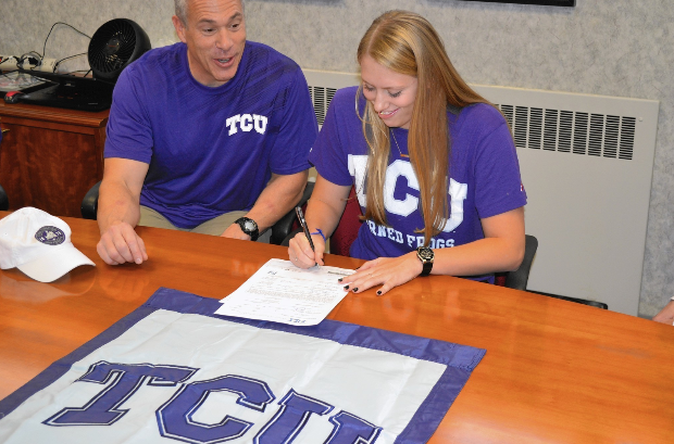 SIGNED SEALED DELIVERED: Senior Ruby Powell signs her NCAA Letter of Intent to swim for the TCU Horned Frogs this coming fall at the Division 1 level. 
