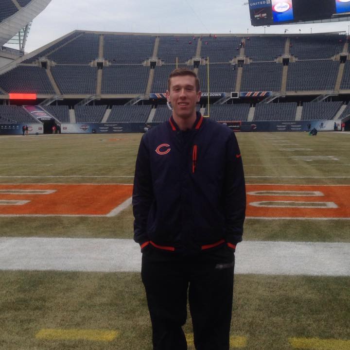 DA’ Bears: Matt Dlugie stands on Soldier Field for his broadcast sports journalism internship.